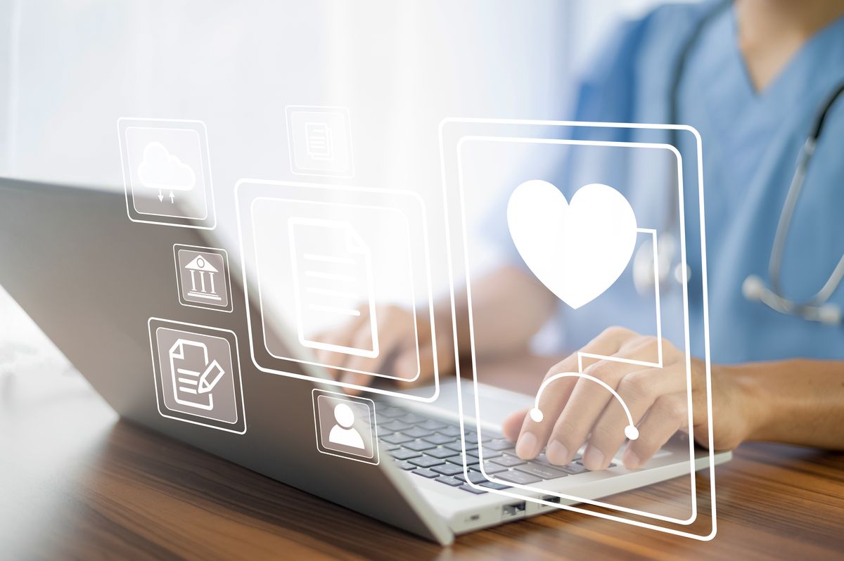 Dedicated care coordinator assisting patient with appointment scheduling and care management